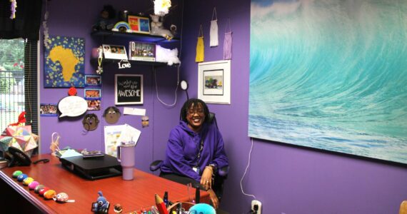 Danielle McFarlane in her colorful office at Twin Lakes Elementary. Photo by Keelin Everly-Lang / The Mirror.