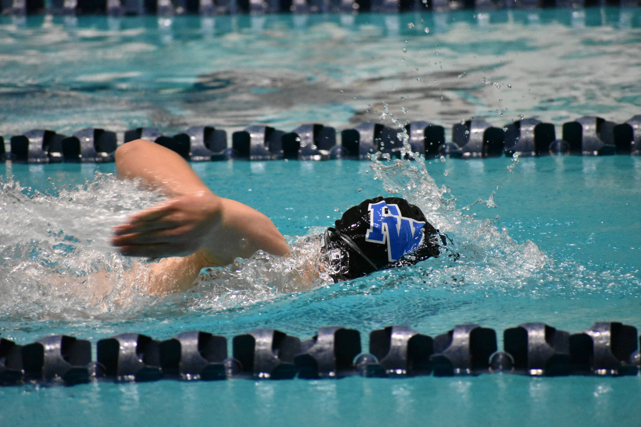 A Federal Way swimmer competes in a freestyle race. Ben Ray / The Mirror
