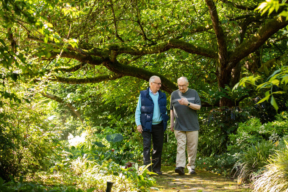 Walking promotes physical health, but it also provides a tranquil setting for social interactions among friends. Photo courtesy Village Green