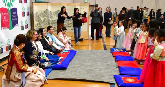 Students get ready to perform Sebae, a deep bow, wishing elders Happy New Year at the Korean School on Feb. 10. Photos by Bruce Honda