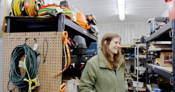 Amanda Miller at the South King Tool Library in Federal Way as she looks for a tool for a visitor. Photo by Keelin Everly-Lang / The Mirror
