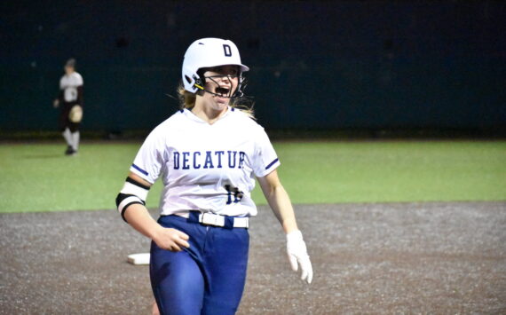 Audrey Deviney is elated after her home run against the Enumclaw Hornets. Ben Ray / The Mirror