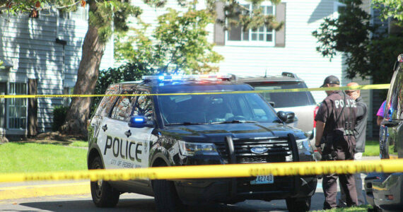 Federal Way police officers investigate a crime scene. File photo
