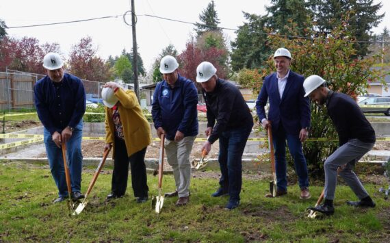 David Harrison, alongside other Fusion partners digging into the ground at their future duplex on April 11, 2024. Photo by Joshua Solorzano/ Federal Way Mirror