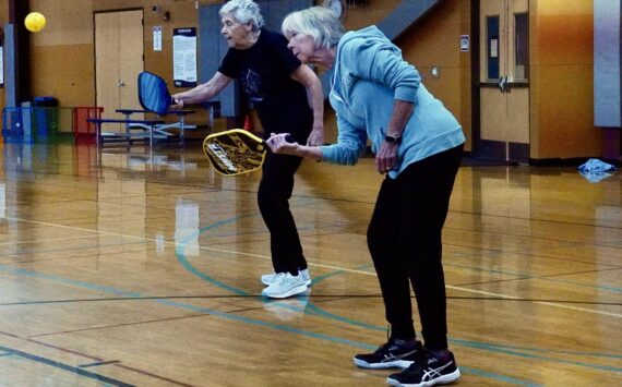 Annette Petrovich and Linda Whipple play pickleball at the Federal Way Community Center. Photo by Joshua Solorzano/The Mirror