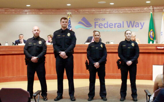 New officers of the Federal Way Police Department: Officer Sergey Peshkov, Officer Troy Petersohn, Officer Carrie Boschetti and Officer Jessie Perry. Photo by Keelin Everly-Lang / The Mirror
