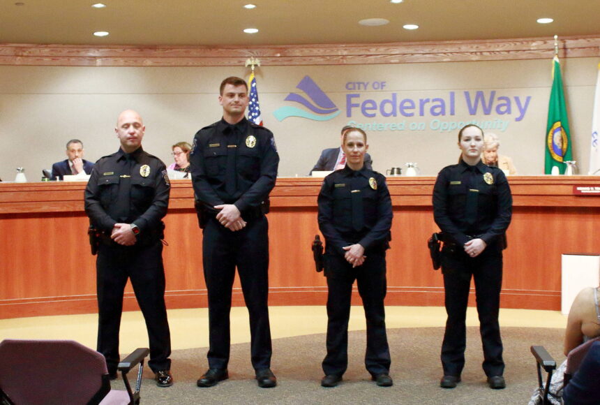 <p>New officers of the Federal Way Police Department: Officer Sergey Peshkov, Officer Troy Petersohn, Officer Carrie Boschetti and Officer Jessie Perry. Photo by Keelin Everly-Lang / The Mirror</p>
