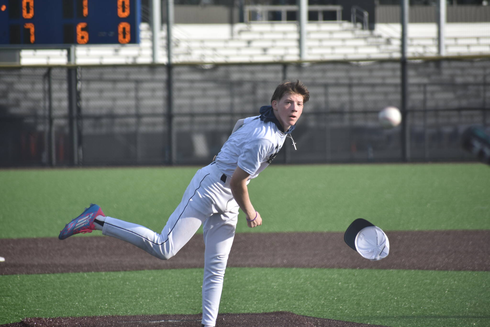 Sophomore Tyler Buol loses his hat after delivering a pitch. Ben Ray / The Mirror