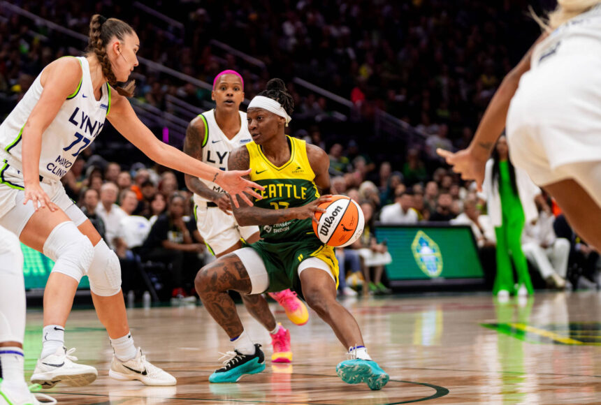 <p>Erica Wheeler drives to the basket against the Minnesota Lynx. Photo courtesy of Seattle Storm.</p>