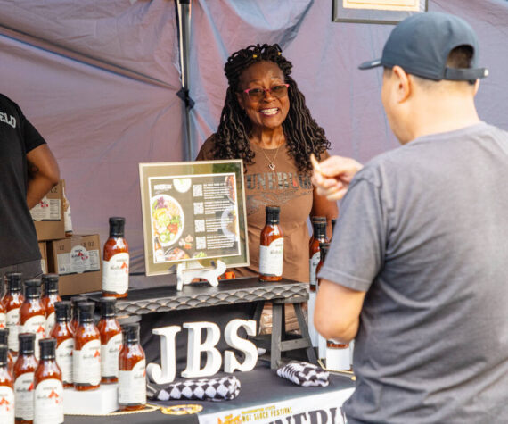 Gail Thompson, owner of Junebug’s Sauce, sets up shop at the Kent Farmer’s Market. Madison Kirkman/Comcast photo