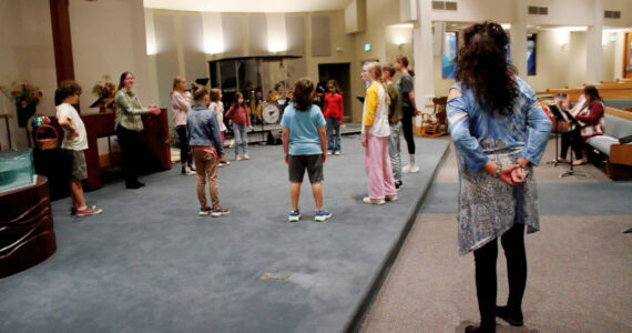 With only two weeks left until their 2025 performance, munchkin actors practiced a group dance for St. Luke’s production of “The Wizard of Oz.” Photo by Keelin Everly-Lang / the Mirror