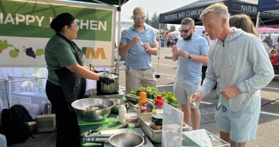 Mukilteo elected officials and VIPs get the chance to taste test at a demonstration by Chef Martha Gamboa earlier this year. Courtesy photo