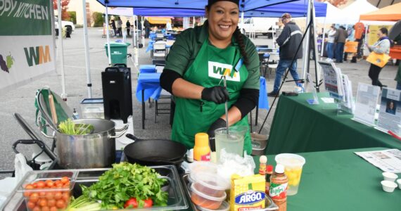 Photo by Bruce Honda 
Chef Martha Gamboa partnered with WM to bring the Scrap Happy Kitchen to the Federal Way Farmers Market on Oct. 18 to educate people about food waste.