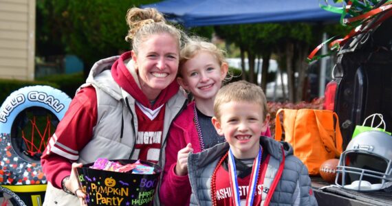 Bouts of rain, wind and sun kept the FUSION Trunk or Treat rolling along! Kids and adults in costume had fun with back of vehicle activities and treats Oct. 25 at the Pete Andersen Family Center located at 1505 S. 328th St. in Federal Way. Photo by Bruce Honda
