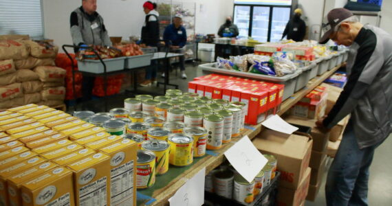 Volunteers and staff at the Multi-Service Center food bank. (Mirror file photo)
