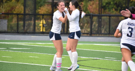 Grace Lepkowski (left) celebrates her go-ahead goal. Ben Ray / The Mirror