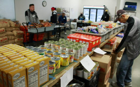 Volunteers and staff at the Multi-Service Center food bank. (Mirror file photo)