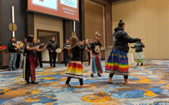 The Muckleshoot Canoe Family begin the coordinator gathering with a cultural opening ceremony. Photo by Bailey Jo Josie/Sound Publishing