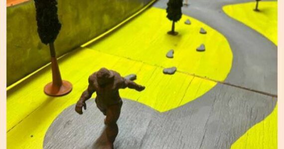 Artist Steve Nagode brought a scale diorama to City Hall to share his proposal, which would include statues, seating and a variety of interactive elements. (City photo)