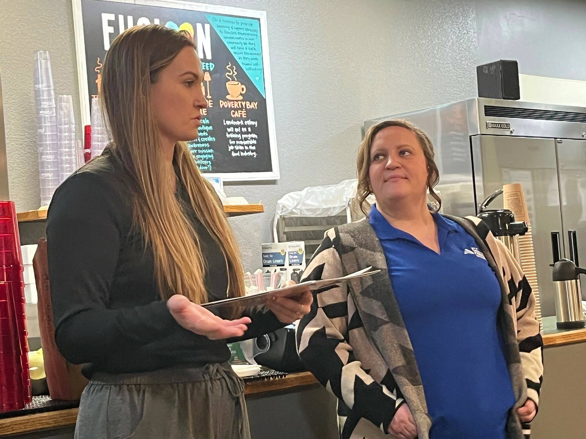The Federal Way Community Center’s Sabrina Bates, inclusion coordinator, and Brittany Marth, inclusion assistant, talk about the city’s programs for people with disabilities during the Federal Way Mirror’s Hot off the Presses community conversation Dec. 9 at Poverty Bay Cafe. Staff photo