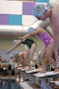 The Federal Way Stingrays dominated the pool in the recent dual meet against the Auburn Sharks from the Auburn School District Pool. These swimmers are set for the 11- and 12-year-old 50 yard breaststroke event. Pictured from left to right: Anna Kasner