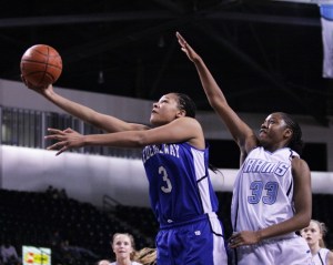 Federal Way senior Talia Walton goes up for a shot Monday night during the Eagles' 66-56 win over the Mount Rainier Rams Monday at the ShoWare Center. The victory gave the Eagles the West Central/Southwest Bi-District Tournament title. It's the second time Federal Way has won a district crown.