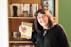 April Knight holds 'Chicken Soup for the Soul: Time to Thrive'