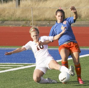 Decatur High School's Victoria Braun attempts to take the ball from an Auburn Mountainview player during the Gators' 2-0 loss Thursday at Federal Way Memorial Stadium. Decatur will play Kennedy Catholic in the Class 3A playoffs at 5:30 p.m. at Highline Stadium on Nov. 2.
