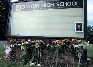 Flowers and messages were placed at Decatur High School’s billboard along South 320th Street for three students involved in a fatal crash in 2010. Two of the students