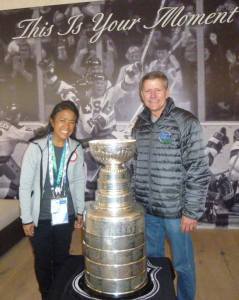Sue and Bob Celski stand with the Stanley Cup at the USA House in Sochi on Tuesday.