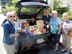Members of the Federal Way Service Club Network recently donated food for Multi-Service Center's Summer Meals Drive. The organization is set to make another donation delivery on Aug. 12.
