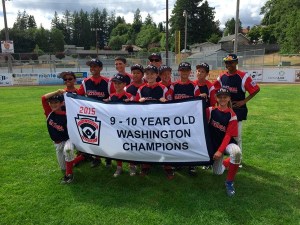 Federal Way National 9/10 all-stars hold their state championship banner. Pictured (not in order): R’Mani Adams