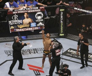 Decatur High School graduate Benson Henderson points to the sky before his fight against Clay Guida Saturday night inside the Honda Center in Anaheim at UFC on FOX. Henderson won a unanimous decision over Guida and will face Frankie Edgar for the UFC lightweight championship in February in Japan.