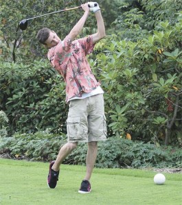 Decatur High School golfer Garrett Shepard practices on Thursday at Twin Lakes Golf and Country Club.