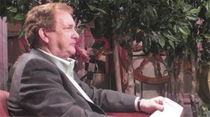 George Pettingell prepares to tape an interview with columnist Walter Backstrom for 'Public Report.'