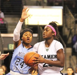 Beamer sophomore Nia Alexander takes the ball to the basket during the Titans' first loss of the season to Mount Rainier in the SPSL Championship game Tuesday at the ShoWare Center in Kent.