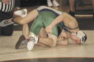 Todd Beamer High School senior Trevor Mills won the 130-pound Region II wrestling title Saturday with a win over Rogers’ Brian Bitney at Beamer. Mills will be the region’s top seed into the Mat Classic state wrestling championships inside the Tacoma Dome.