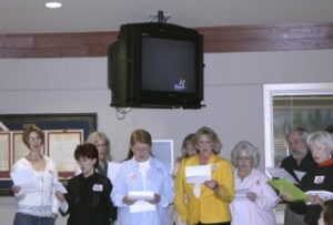 About 20 art enthusiasts sang about their support of asking the state legislature to partially fund a performing arts center at the Federal Way City Council meeting Tuesday. The council voted