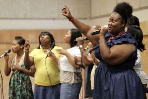 Integrity Life Church singers perform 'Moving Forward' on Sept. 11 at Sacajawea Middle School in Federal Way as part of a 9/11 remembrance and prayer event.