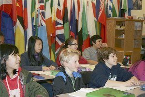 Students in Mark Klumpsenhower's English class laugh during a grammar lesson at the Federal Way Public Academy on a recent morning.