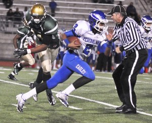 Federal Way junior Keenan Curran runs the ball through the Auburn defense during the Eagles’ 43-0 win over the Trojans last week at Auburn Memorial Stadium. The Eagles will take on Curtis at 7 p.m. in University Place Friday for the SPSL South title.