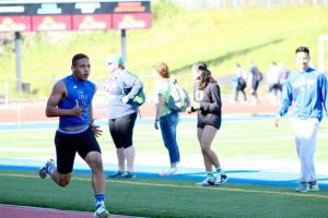 Federal Way's Damani Thomas runs in the 200-meter event. He won with a time of 22.79.