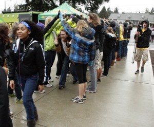 Participants in the One Day Federal Way Walk for the Homeless reach the finish line Feb. 21 at Our Saviors Baptist Church.