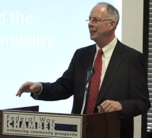 Federal Way Mayor Skip Priest delivers his state of the city address on March 6 at the Federal Way Chamber of Commerce membership luncheon at Twin Lakes Golf and Country Club.