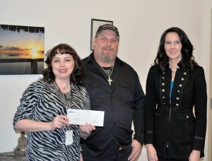 Multi-Service Center CEO Robin Corak (left) with Rick Pudmoroff (center) and Federal Way Council member Kelly Maloney