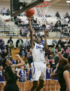 Jalen McDaniels scores during a regional playoff game.