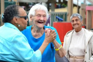 Residents dance to live entertainment during the Federal Way Kiwanis Club’s 59th annual salmon bake on Friday at Steel Lake Park.