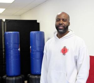Christopher Frazier opened the Keishindo Martial Science Academy in Federal Way last month. His mother’s murder nine years ago now motivates Frazier to impact kids through coaching.
