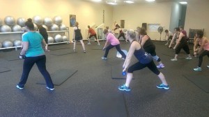 Kimberly DeMile leads a Jazzercise class on Saturday