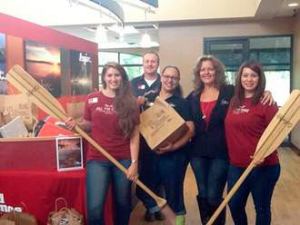 Red Canoe staff with donated supplies received for Federal Way students.